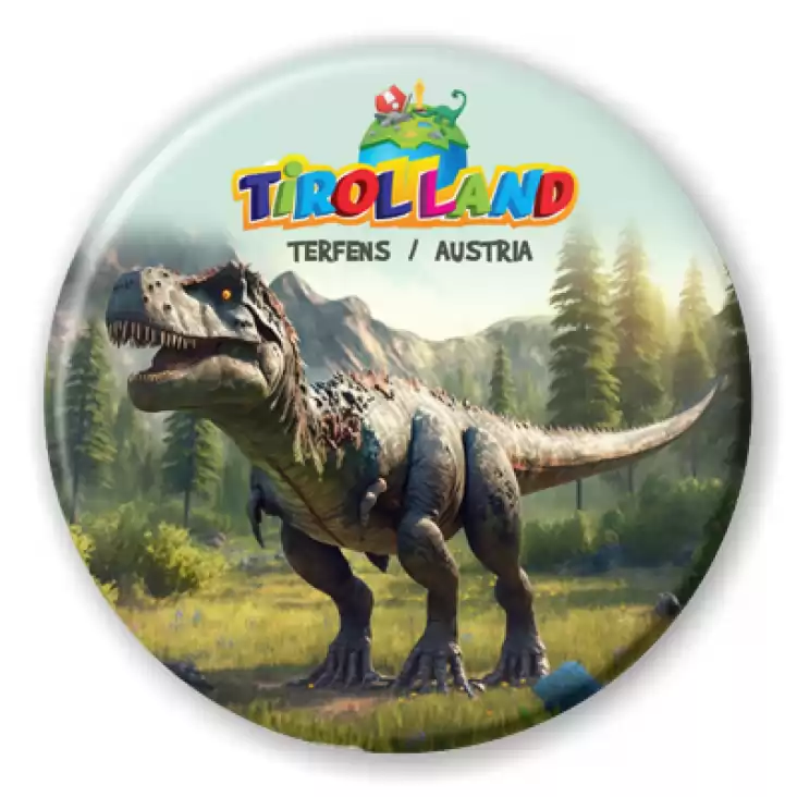 przypinka Duży dinozaur na tle gór Tirolland