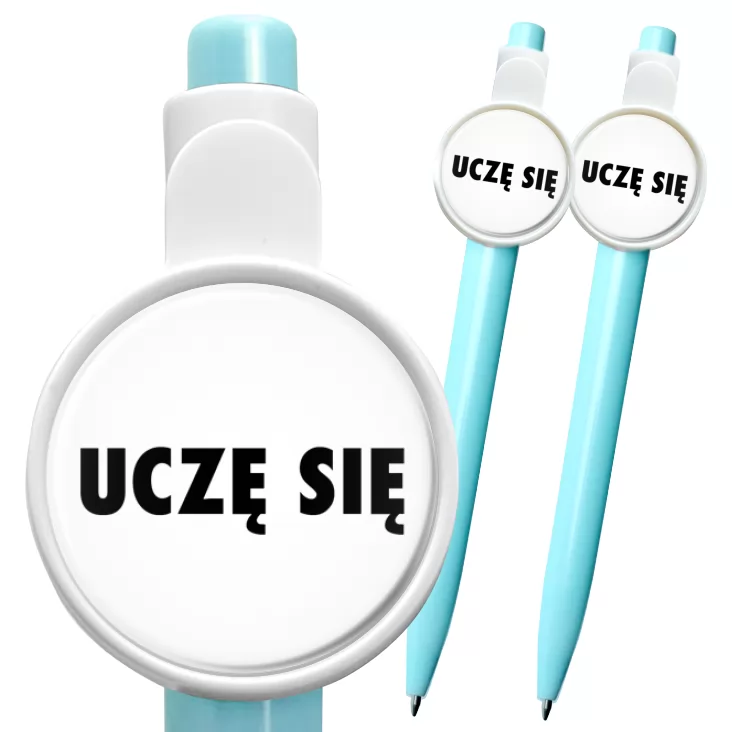 przypinka długopis Uczę się białe tło