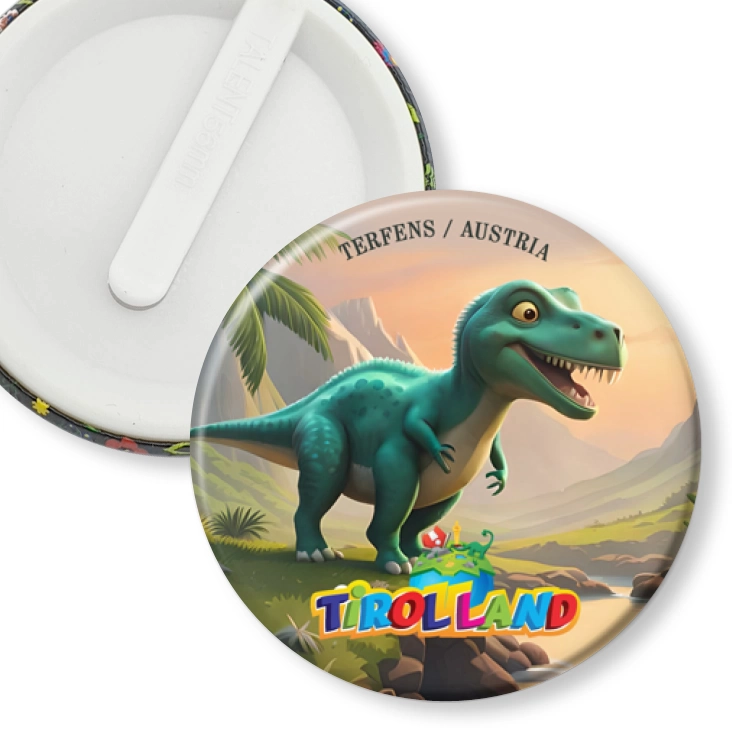przypinka klips Zielony tyranozaur na tle gór Tirolland