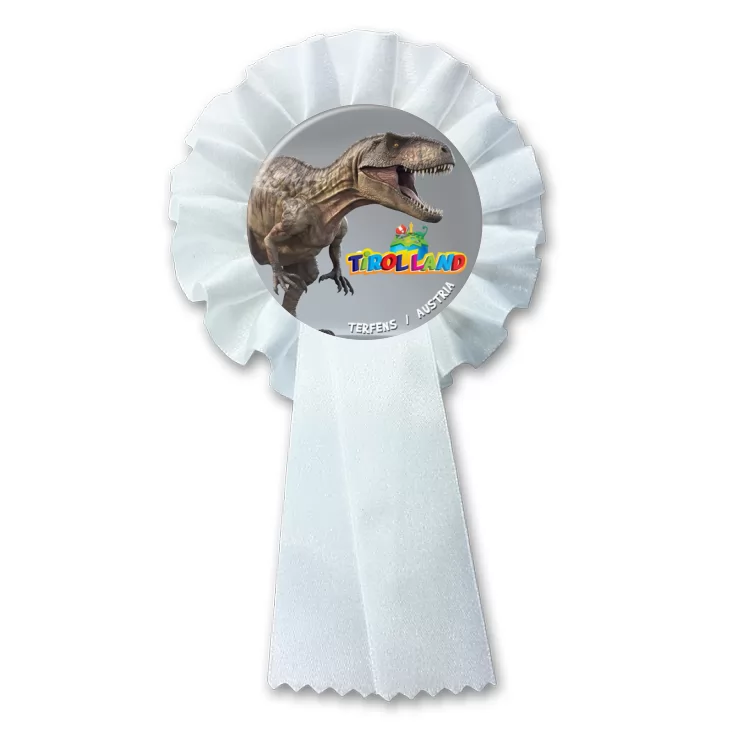 przypinka kotylion Tirolland Tyranozaur na szarym tle