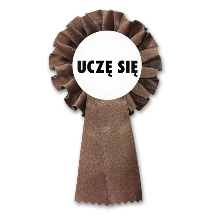 przypinka kotylion Uczę się białe tło
