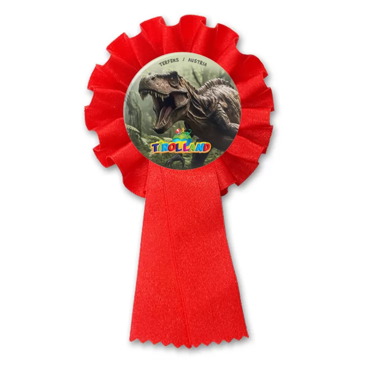 przypinka kotylion Groźny dinozaur na tle lasu Tirolland