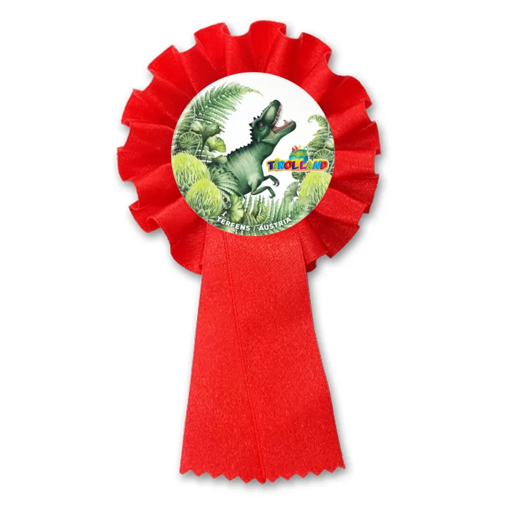 przypinka kotylion Tyranozaur wśród roślin Tirolland
