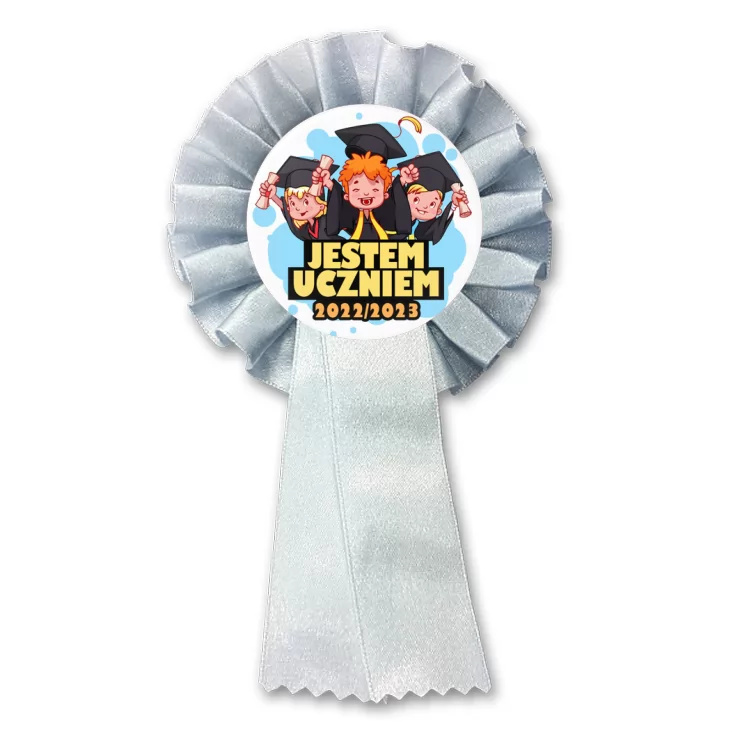 przypinka kotylion Jestem Uczniem trójka z biretami