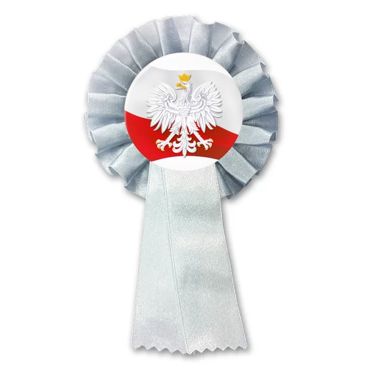 przypinka kotylion Orzeł w koronie na tle powiewającej flagi Polski