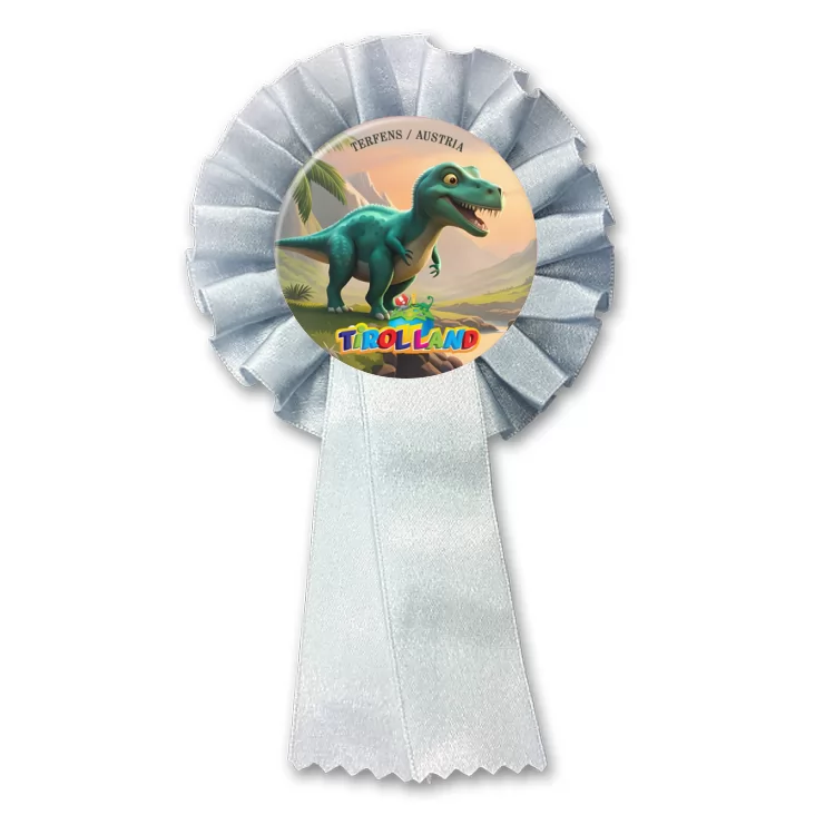przypinka kotylion Zielony tyranozaur na tle gór Tirolland
