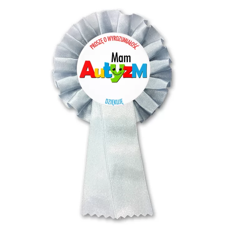 przypinka kotylion Mam autyzm. Barwny napis.