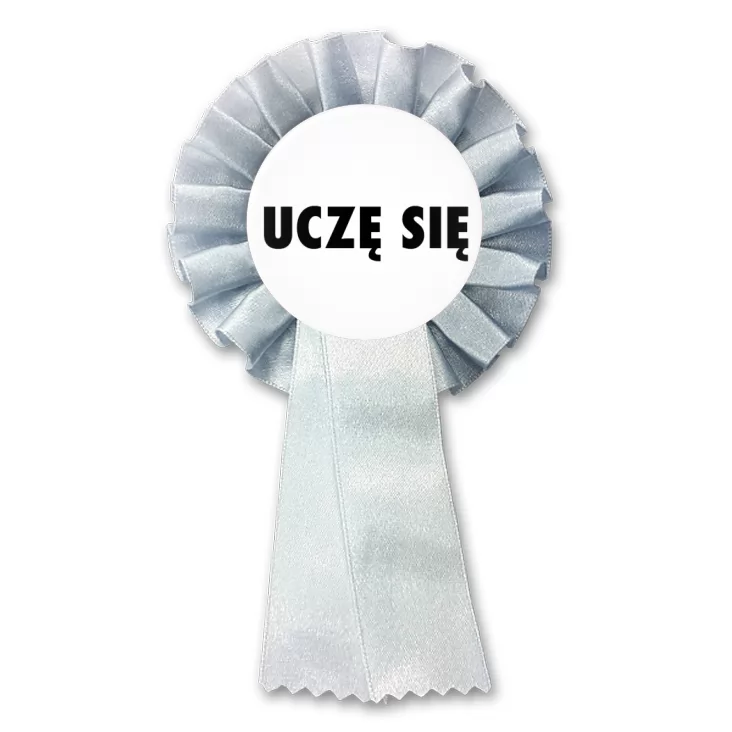 przypinka kotylion Uczę się białe tło