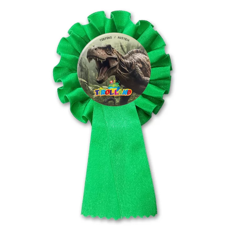 przypinka kotylion Groźny dinozaur na tle lasu Tirolland