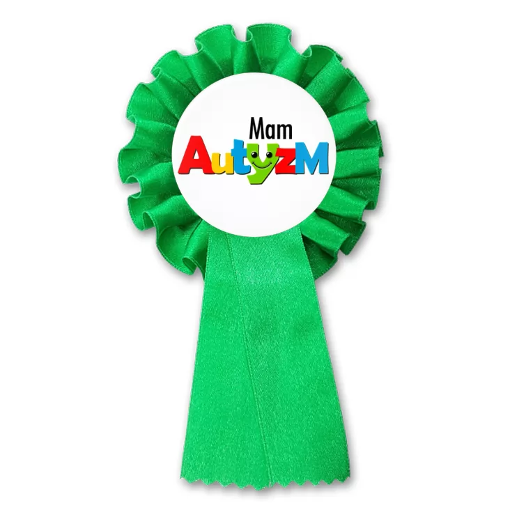 przypinka kotylion Mam autyzm. Kolorowe literki.