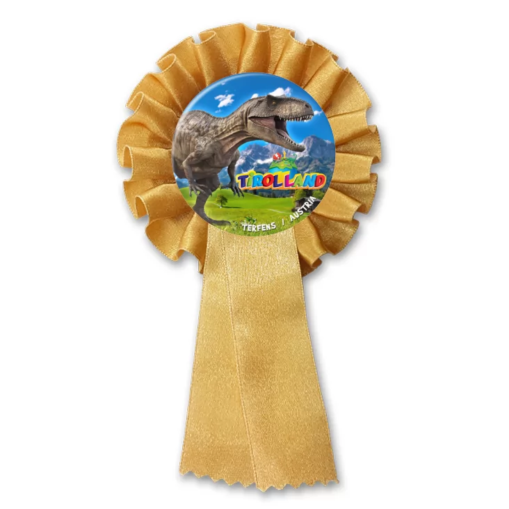 przypinka kotylion Tirolland Tyranozaur na tle gór