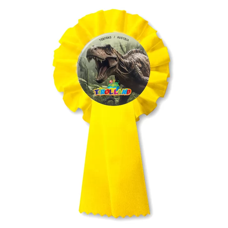 przypinka kotylion Groźny dinozaur na tle lasu Tirolland