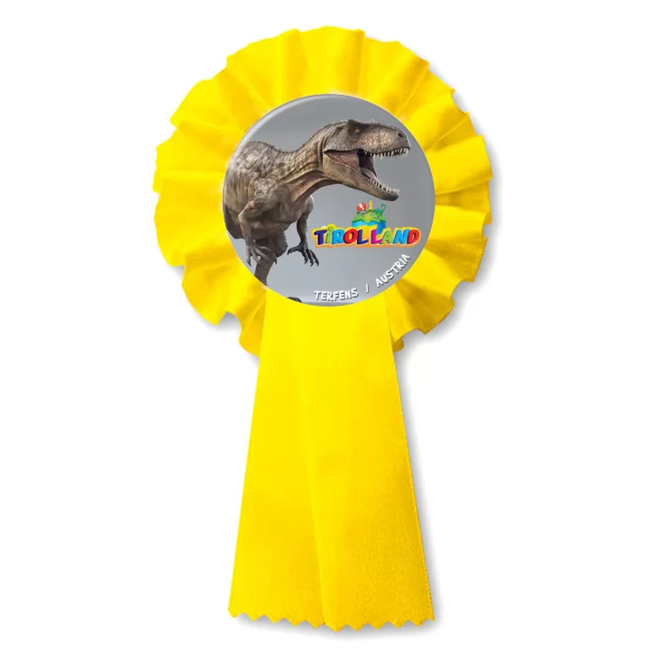 przypinka kotylion Tirolland Tyranozaur na szarym tle
