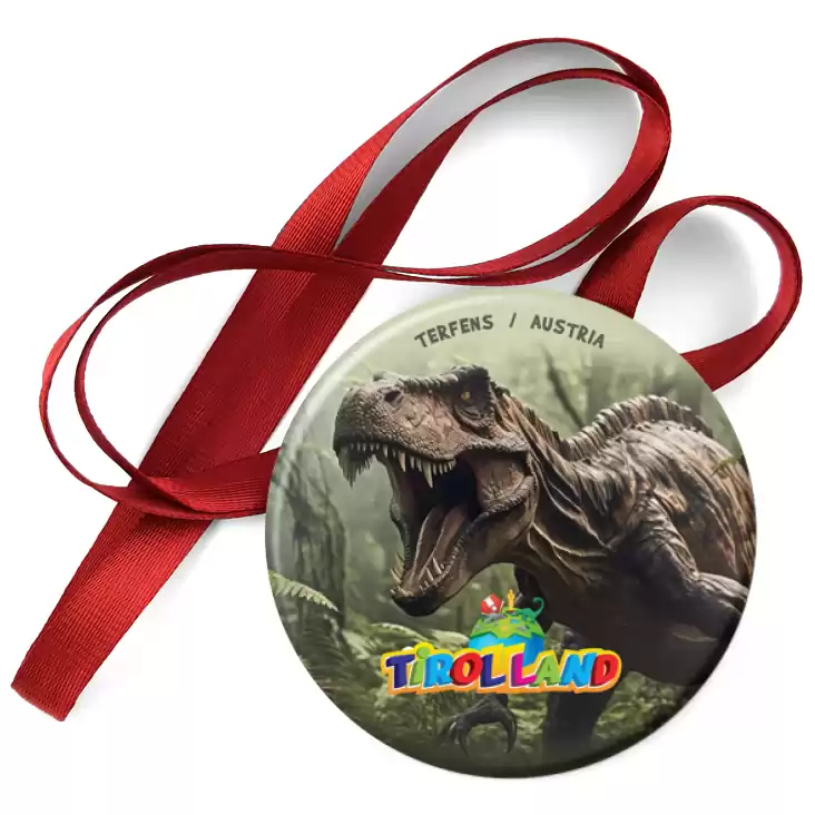 przypinka medal Groźny dinozaur na tle lasu Tirolland