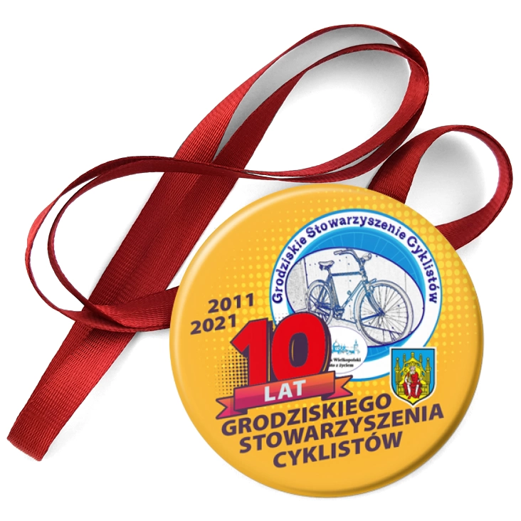 przypinka medal 10 lat Grodziskiego Stowarzyszenia Cyklistów