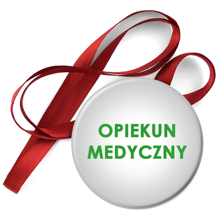 przypinka medal Opiekun medyczny na szarym tle