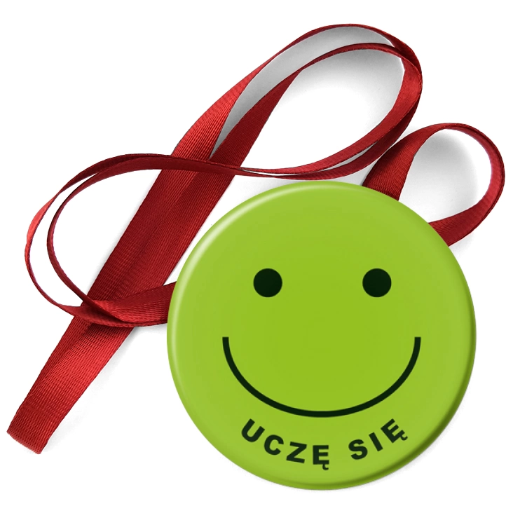 przypinka medal Uczę się na zielonym tle