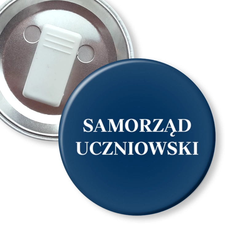 przypinka z żabką Samorząd Uczniowski na niebieskim tle