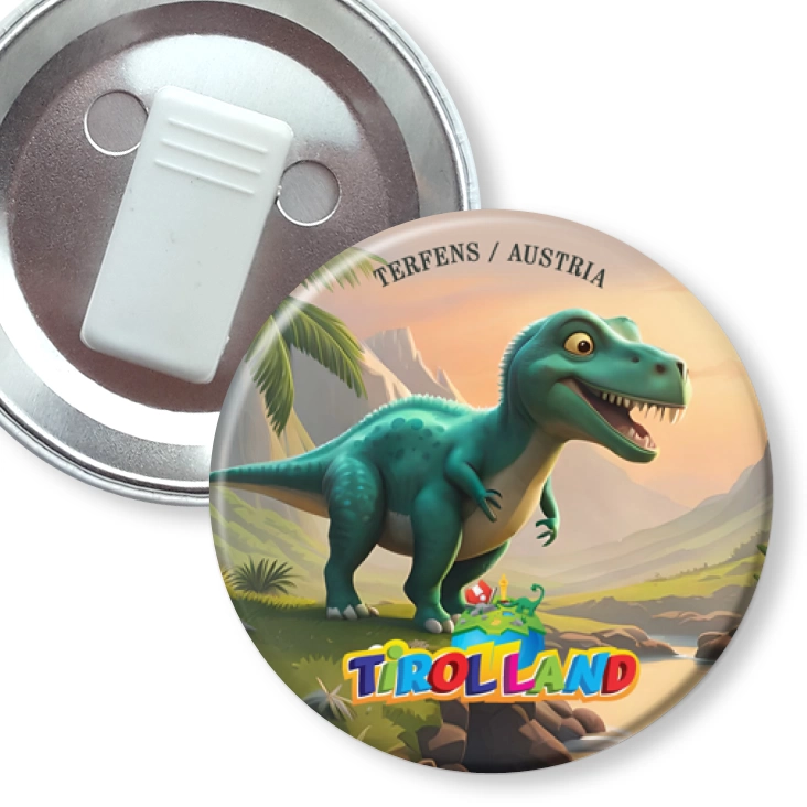 przypinka z żabką Zielony tyranozaur na tle gór Tirolland