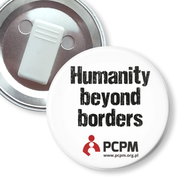 przypinka z żabką Humanity beyond borders